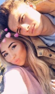 Ria Hughes with her boyfriend Daniel James clicking selfies on Snapchat.